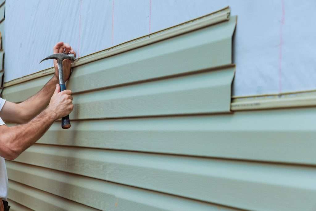 Nuvista general contractors replacing damaged home siding