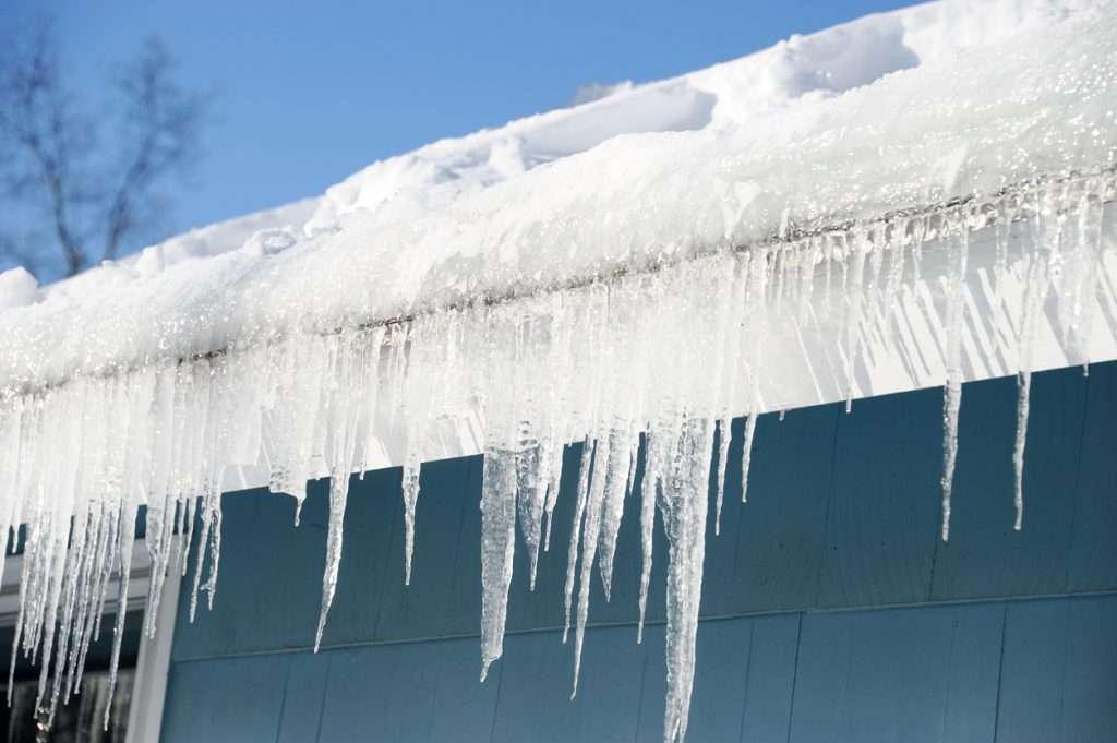 winter and ice can damage old gutters