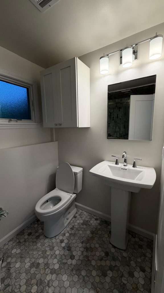 Bathroom remodel with pedestal sink by Nuvista Designs General Contractors in Bergen County, NJ