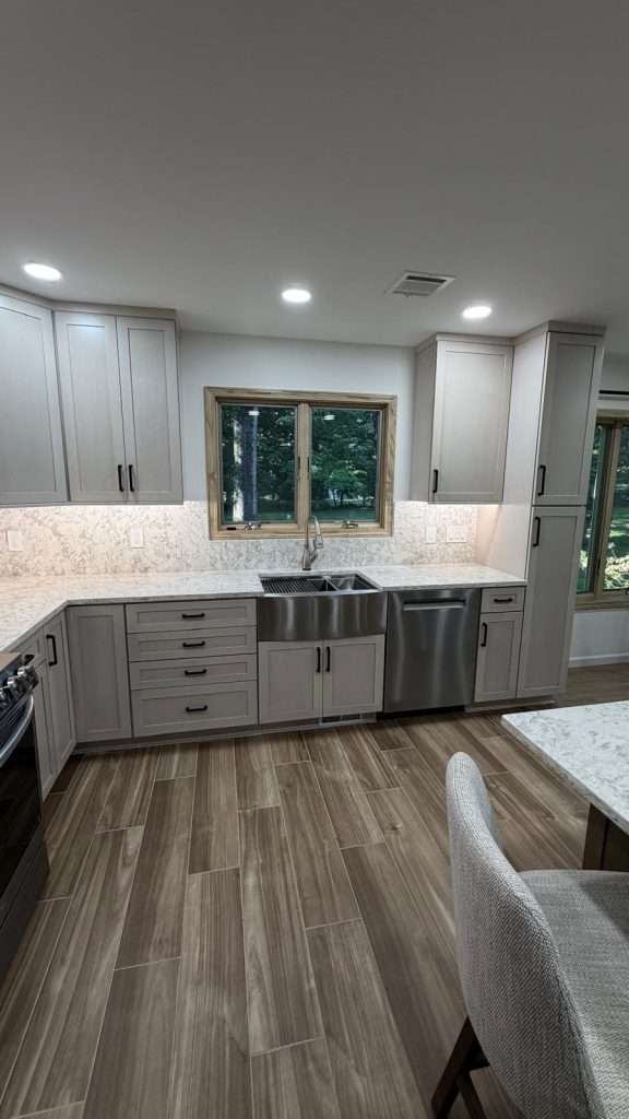 Kitchen remodel with island and gray cabinets by Nuvista Designs General Contractors in Bergen County, NJ