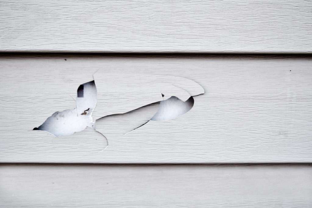 damaged siding due to 