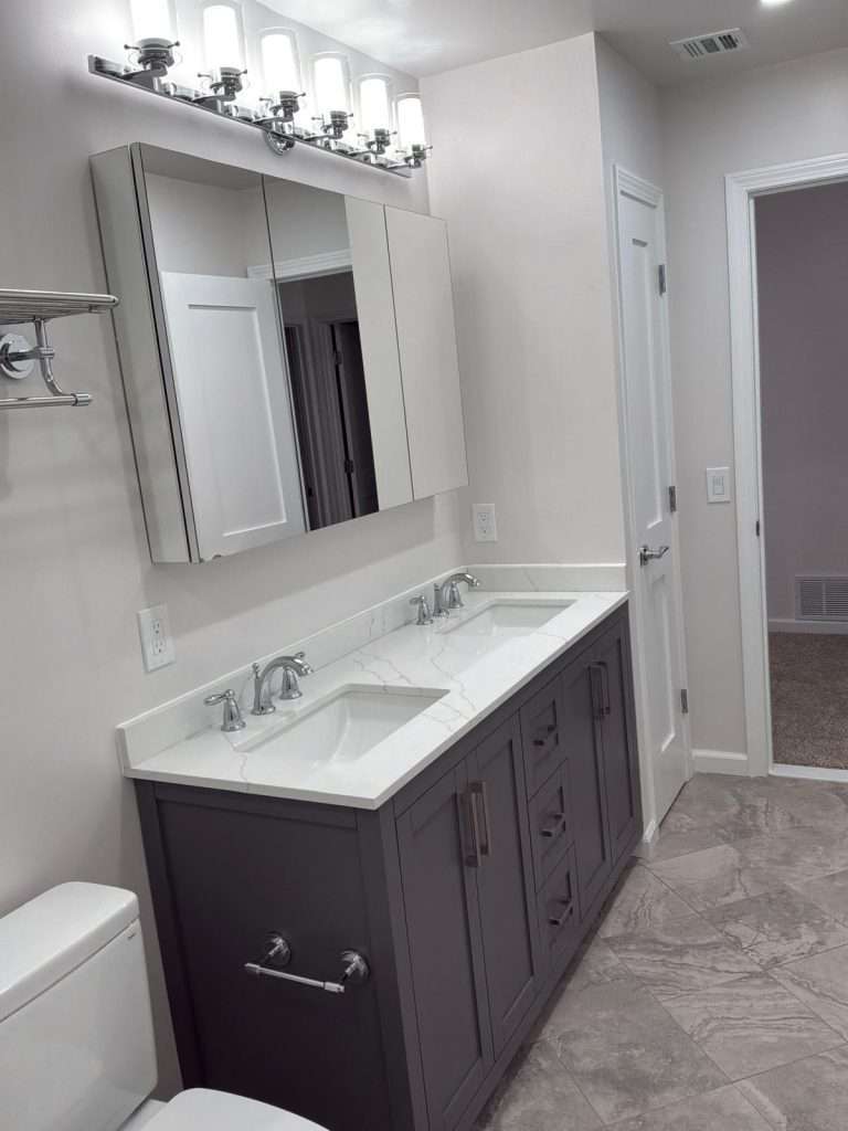 Bathroom remodel with double vanity by Nuvista Designs General Contractors in Bergen County, NJ